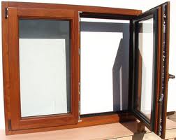 Instalación de ventana PVC acabado imitación madera roble dorado